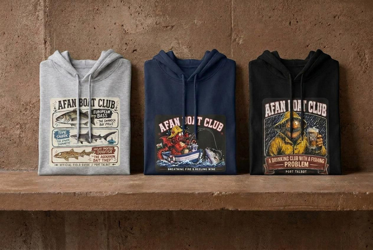 Three Afan Boat Club hoodies side by side, Light Marl Grey, Navy Blue and Black, showing the range of colours available.