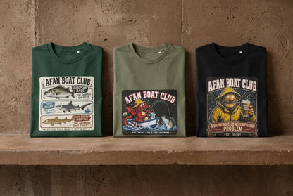 Three Afan Boat Club tees side by side in bottle green, earth green and black, showing colour range.