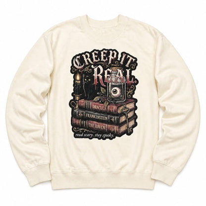 Heavyweight oversized autumn sweatshirt in cream with vintage gothic Halloween book lover design.