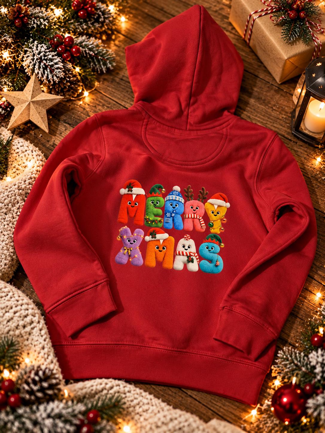 Back view of festive red children's Christmas hoodie, ages 4–6, featuring a large, colourful MERRY XMAS design with cheerful festive character letters, made from premium 350 GSM organic cotton blend fabric.